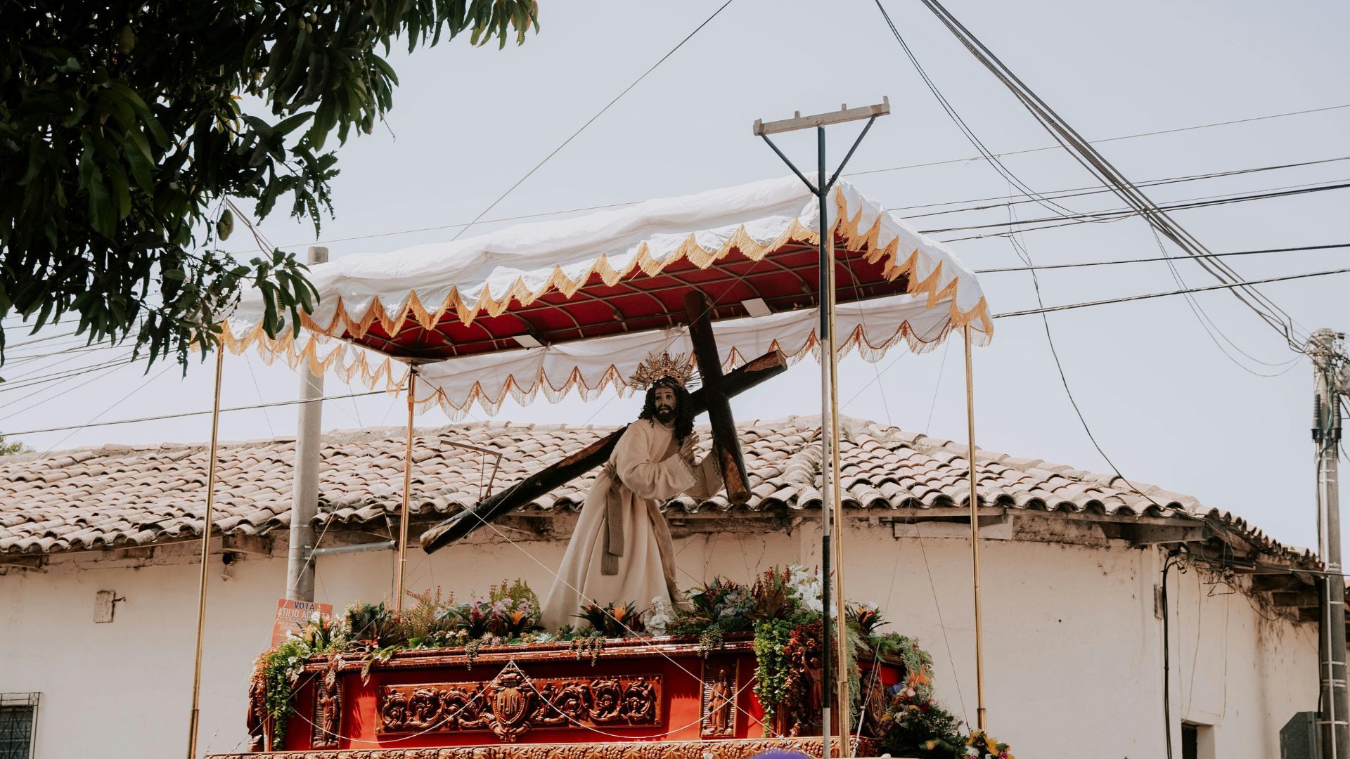 # **Holy Week in Guatemala 2025: Tradition, Faith, and a Unique Cultural Spectacle**  

Holy Week in Guatemala is more than just a holiday; it is an experience full of faith, art, culture, and tradition. Considered one of the most impressive celebrations in the world, it stands out for its majestic processions, sawdust carpets, and the deep religious devotion that fills every corner of the country.  

## **What is Holy Week in Guatemala?**  

Holy Week commemorates the Passion, Death, and Resurrection of Jesus Christ, but in Guatemala, this celebration goes beyond religion. It has been declared an Intangible Cultural Heritage of Humanity by UNESCO due to its spectacular expression of devotion and ephemeral art.  

The processions, carpets, and religious activities make this week a unique event, transforming the country into a stage of history and tradition.  

![5.jpg](https://s3.us-south.cloud-object-storage.appdomain.cloud/bucket-travelisimo/5_a7ef0c1820)  

## **Best Cities to Experience Holy Week in Guatemala**  

### **Antigua Guatemala**  
Famous for its impressive processions, colorful carpets, and colonial atmosphere, Antigua Guatemala is the epicenter of Holy Week in the country. Its cobblestone streets fill with locals and tourists witnessing the massive processional floats, carried on the shoulders of hundreds of devotees.  

### **Guatemala City**  
The capital hosts some of the oldest and most imposing processions. Parishes and religious brotherhoods organize processions that flood the streets with thousands of faithful, creating a solemn atmosphere accompanied by live funeral marches.  

### **Quetzaltenango**  
Holy Week in Quetzaltenango is known for its solemnity and unique highland traditions. Its processions and religious activities attract worshippers from various regions, making it one of the most authentic celebrations in the country.  

![6.jpg](https://s3.us-south.cloud-object-storage.appdomain.cloud/bucket-travelisimo/6_379cb98e64)  

## **Key Dates for Holy Week 2025**  

- **Palm Sunday – April 13**: The beginning of Holy Week with the blessing of palms and major processions.  
- **Holy Thursday – April 17**: Commemoration of the Last Supper and the washing of feet, followed by nighttime processions.  
- **Good Friday – April 18**: The most solemn day, featuring massive processions and intricate sawdust carpets covering the streets.  
- **Holy Saturday – April 19**: A day of mourning for the Virgin Mary, with special liturgical events.  
- **Easter Sunday – April 20**: Masses and celebrations marking the resurrection of Christ with a joyful atmosphere.  

![4.jpg](https://s3.us-south.cloud-object-storage.appdomain.cloud/bucket-travelisimo/4_fa72acfae9)  

## **Elements That Make Holy Week in Guatemala Unique**  

### **Monumental Processions**  
Religious images are carried on massive floats, lifted by thousands of devotees, moving through the streets to the sound of solemn funeral marches. Many wear traditional purple or black robes, symbolizing mourning and devotion.  

### **Sawdust and Flower Carpets**  
The streets become canvases where local artists create intricate carpets from dyed sawdust, flowers, fruits, and other natural materials. These ephemeral works of art are later destroyed as the processions pass over them, symbolizing devotion and sacrifice.  

### **Funeral Marches**  
Bands perform traditional compositions that set the solemn tone of the processions. Many of these musical pieces have been passed down through generations and are an essential part of Guatemala’s cultural heritage.  

### **Lenten Cuisine**  
During this time, special dishes are prepared, such as dried fish stew, plantains in mole sauce, custard-filled empanadas, travel tamales, and torrejas. These dishes reflect the influence of ancestral cuisine on religious celebrations.  

### **An Unforgettable Atmosphere**  
From the scent of incense filling the air to the sound of church bells and candle-lit altars, Holy Week in Guatemala is a multi-sensory experience that leaves a lasting impression on those who experience it.  

![1.jpg](https://s3.us-south.cloud-object-storage.appdomain.cloud/bucket-travelisimo/1_deb3ee889f)  

## **Planning and Reservations for Holy Week 2025**  

Due to the high number of visitors Guatemala receives during this time, it is recommended to book hotels and tours well in advance. Antigua Guatemala is the most sought-after destination, with accommodations and restaurants filling up weeks before the event.  

Holy Week in Guatemala is an event that combines history, faith, and art in a celebration unlike any other in the world. Experiencing this tradition means immersing yourself in one of the most deeply rooted aspects of Guatemalan culture.  

**Discover the magic of this tradition. Experience Holy Week in Guatemala in 2025.**
