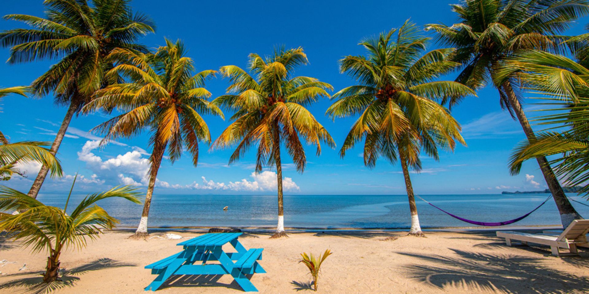The Caribbean of Guatemala, also known as the “Green Caribbean”, is one of the most beautiful and picturesque regions of the country, it is a true gem, known for its beaches, rich culture, impressive biodiversity and delicious gastronomy.

In this blog, we will explore all that the Caribbean has to offer in this country and how you can make the most of your time in this beautiful region. Are you ready? Let's start!

![el-caribe-de-guatemala-izabal.jpg](https://cdn.travelisimo.com/el_caribe_de_guatemala_izabal_50e18e75b1)

##### Credits: Izabal, Guatemala

- - -

### The jewel of the Caribbean in Guatemala: Izabal

Izabal is a department located on the east coast of Guatemala, which is part of the Guatemalan Caribbean. It is known for its stunning white-sand beaches, mangroves, and rainforests, as well as its rich Garifuna history and culture.

The beaches in Izabal are distinguished by their crystal clear waters. Some of the most popular are Livingston, Playa Blanca and Punta de Manabique. However, if you are already in the region you can also visit the Río Dulce National Park, the Castillo de San Felipe, Siete Altares, Biotopo Chocón Machacas and Sendero Las Escobas.

![castillo-san-felipe-caribe-guatemala-izabal.jpg](https://cdn.travelisimo.com/castillo_san_felipe_caribe_guatemala_izabal_4fbdc54b09)

##### Credits:  Castillo de San Felipe, Izabal

- - -

## Livingston, Izabal

Livingston is a small coastal town in Izabal, it is one of the most popular tourist destinations in the Guatemalan Caribbean. It is known for its white sand beaches and its vibrant Garífuna culture. It is an ideal place to enjoy the beach, taste the delicious Caribbean gastronomy, experience Garífuna music and dance.

## Playa Blanca

Located in Izabal, Playa Blanca is a beach with white sand and crystal clear waters that is famous for being one of the most beautiful in the country. The beach is surrounded by coconut palms and has a host of tourist services to enjoy a full day in the sun.

## Punta de Manabique

On the coast of Izabal, Punta de Manabique is a protected area that has an impressive marine and terrestrial biodiversity. The beach is perfect for enjoying water sports and outdoor activities. Are you ready to visit this destination?

###### Book your tours in Guatemala with Travelisimo and get a 10% discount using the code GUATETOURS10 today.

![cultura-garifuna-caribe-guatemala-izabal.jpg](https://cdn.travelisimo.com/cultura_garifuna_caribe_guatemala_izabal_b3c6d89bbf)

##### Credits: BBC News

- - -

### Garifuna history and culture

Garífuna culture is an integral part of Izabal and the Guatemalan Caribbean. It is an Afro-descendant community that has maintained its unique traditions, such as music, dance and gastronomy, throughout the centuries.

The Garífuna presence in Central America is concentrated in Honduras, particularly along its Caribbean coast. The arrival of the Garífunas in Honduras occurred at the end of the 18th century when the British decided to deport the members of this community from San Vicente to the island of Roatán. From Roatán, many of them went to the mainland and spread throughout the Central American region.

According to the BBC, the global population of the Garífuna is about 600,000 people and most are in Honduras and Belize, although they are also found in parts of Guatemala and Nicaragua. Today, there is a significant Garífuna population in Guatemala, especially in the coastal regions of Livingston, Puerto Barrios, and Santo Tomás de Castilla.

![musica-cultura-garifuna-caribe-guatemala-izabal.jpg](https://cdn.travelisimo.com/musica_cultura_garifuna_caribe_guatemala_izabal_a0f4a1e1cf)

##### Credits: Junta de Turismo de Belice

Music and dance are key elements of this culture. The main rhythm is the punta, which is played with drums, maracas and an empty glass bottle that is rubbed with a stick to create a particular sound. Garífuna food is another important aspect of their culture. A popular dish is tapado, a fish and shellfish stew. Garifuna food also includes rice and beans with shrimp.

Garífuna crafts are another important part of their culture. The Garifuna are known for their cotton and linen fabrics, which are woven into colorful patterns and used to make clothing and accessories such as bags and blankets. They are also known for their wood carving, which is used to make animal figures and utilitarian objects such as plates and bowls.

Fortunately, the Garífuna culture remains a vibrant and vital part of Guatemalan society. The Garifuna continue to uphold their cultural traditions and practices, and have created organizations and community groups to promote their culture.

Are you ready to visit the Guatemalan Caribbean and learn more about the Garífuna culture? Plan your trip with [Travelisimo](https://travelisimo.com/es) now and discover the best that Guatemala has to offer.
