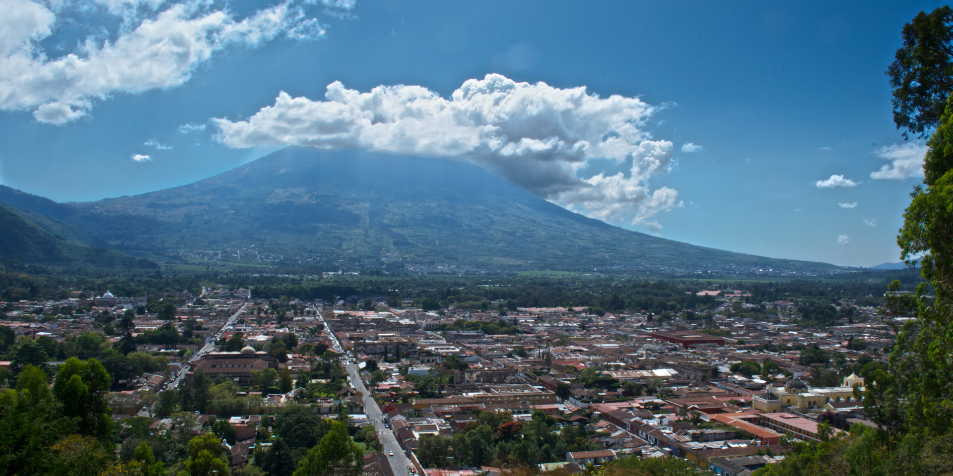 Viewpoints in Atitlán and Antigua Guatemala offer breathtaking views of the surrounding landscapes and are must-visit destinations for travelers seeking a unique experience in these beautiful cities.

Get to know some of the most important viewpoints in Guatemala, where you can have a wonderful experience surrounded by nature during sunrise, sunset, or anytime of the day you prefer.

![foto-blog-miradores-atitlan-antigua-guatemala.png](https://cdn.travelisimo.com/foto_blog_miradores_atitlan_antigua_guatemala_12b1415a0c)
##### Credits: Photograph of Altamira Viewpoint, Antigua Guatemala (Fredy Hernández/Soy502).

---
## Mirador del Rostro Maya

Mirador del Rostro Maya is a popular destination for its breathtaking scenery. It is the only viewpoint around Lake Atitlán that offers a complete 360-degree view of the surrounding area.

The viewpoint is perfect for adventure seekers, as it can only be reached after a one-hour hike through the lush jungle. This hike offers a unique opportunity to experience the natural beauty of the area and breathe in the fresh air.

Located in San Juan La Laguna, Mirador del Rostro Maya is a must-visit location for those looking for a truly unforgettable experience in Atitlán, as it provides a full panoramic view of the lake and its stunning surroundings.

![foto-blog-miradores-atitlan-antigua-antigua-guatemala-rostro-maya.png](https://cdn.travelisimo.com/foto_blog_miradores_atitlan_antigua_guatemala_rostro_maya_4d8647dea1)
##### Credits: Photo of a man observing the beautiful view from the Mirador del Rostro Maya (Luis Rendón, in his page el Rendón de Mochilero)

---
## Cerro de Oro

Another popular viewpoint in Atitlán is Cerro de Oro, which offers views of the lush green mountains and the sparkling waters of the lake. It is located in the southern part of Lake Atitlán, between the towns of San Lucas Tolimán and Santiago Atitlán.

Is a popular starting point for those seeking to climb to the top of the hill and admire the stunning views of the surrounding area. The ascent takes approximately 40 to 50 minutes and offers a unique opportunity to immerse yourself in the natural beauty of the region. This activity is ideal to watch the sunrise.

![foto-blog-miradores-atitlan-antigua-guatemala-cerro-oro.png](https://cdn.travelisimo.com/foto_blog_miradores_atitlan_antigua_guatemala_cerro_oro_adf9756976)
##### Credits: Photograph of Cerro de Oro (José Mata E.)

---
## Cerro Tzankujil

Cerro Tzankujil is a well-known nature reserve in San Marcos La Laguna that is perfect for those looking to get away from the hustle and bustle of everyday life. With a range of outdoor activities to choose from, such as scenic hiking trails, stunning viewpoint overlooks, kayaking, and even the opportunity to take a leap into Lake Atitlán, there's no shortage of adventure to be had at this beautiful destination.

The swimming areas offer an unforgettable experience. It is important to mention that to enter the reserve, Guatemalans must pay Q 10.00 and foreigners Q15.00, but worth every penny. 

###### Are you going to visit Lake Atitlán soon? Book your accommodation with Travelisimo using the code LAKEHOUSE to get a 10% discount.

![foto-blog-miradores-atitlan-antigua-guatemala-cerro-tzankujil.png](https://cdn.travelisimo.com/foto_blog_miradores_atitlan_antigua_guatemala_cerro_tzankujil_f23f0f4fb5)
##### Credits: Photograph of Cerro Tzankujil.

---
## Cerro de La Cruz

Cerro de La Cruz viewpoint is a very popular spot in Antigua Guatemala. Admission is free and the viewpoint is open until 6:00 p.m. It is known for offering breathtaking views of the colonial city and the Volcán de Agua.

It is located on North Avenue in Antigua Guatemala, visitors can either hike up the well-maintained trail or drive to the top of the hill. It offers panoramic views of Antigua, including the stunning colonial architecture and the lush green hills. This viewpoint is a great place to take a picnic and watch the sunset over the city.

![foto-blog-miradores-atitlan-antigua-guatemala-cerro-cruz.png](https://cdn.travelisimo.com/foto_blog_miradores_atitlan_antigua_guatemala_cerro_cruz_a59557b796)
##### Credits: Photograph of Cerro de La Cruz, overlooking La Antigua Guatemala.

---
## Cerro San Cristóbal

Indulge in the breathtaking views and delectable cuisine at Cerro San Cristóbal Restaurant. Located close to Antigua Guatemala, it offers a stunning panoramic view of the colonial city.

The menu features traditional and international dishes, with plates starting at Q35.00, it's a great option for those looking for affordable and delicious food in a picturesque setting.

![foto-blog-miradores-atitlan-antigua-guatemala-cerro-san-cristobal.png](https://cdn.travelisimo.com/foto_blog_miradores_atitlan_antigua_guatemala_cerro_san_cristobal_256dbab912)
##### Credits: Photo of a Restaurant at Cerro San Cristobal.

---
Both Atitlán and Antigua offer a variety of activities and attractions for travelers, from shopping and dining to exploring the rich history and culture of these cities. Whether you are interested in hiking and exploring the natural beauty of the area or soaking up the rich cultural heritage of these cities, the viewpoints in Atitlán and Antigua are sure to provide a unique and unforgettable experience.

The breathtaking viewpoints in Atitlán and Antigua Guatemala are must-visit destinations for travelers seeking a unique and unforgettable experience.  So why not add these amazing viewpoints to your travel itinerary and experience the beauty of Guatemala for yourself?
