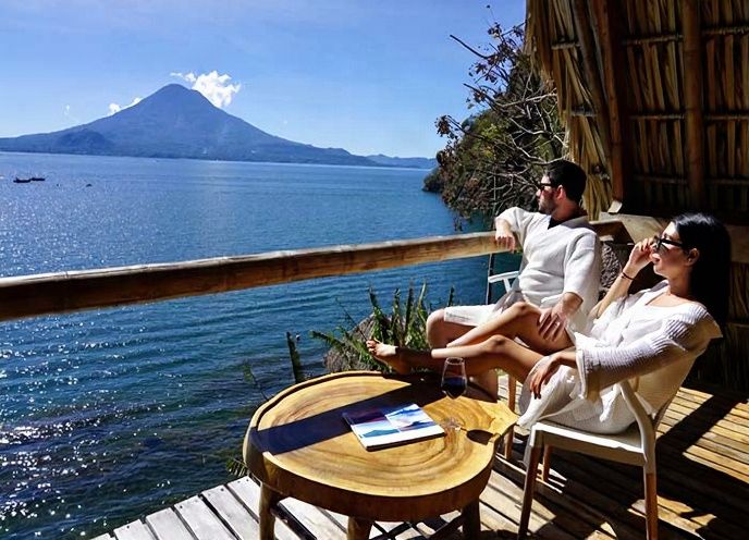 Wooden deck overlooking Lake Atitlán with views of Tolimán volcano in Panajachel, Guatemala