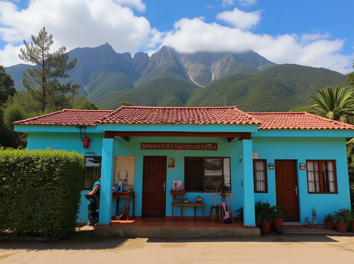 Colonial lakeside house in Santa Catarina Palopó with turquoise walls, red frames and magenta bougainvillea in bloom covering the facade facing Lake A