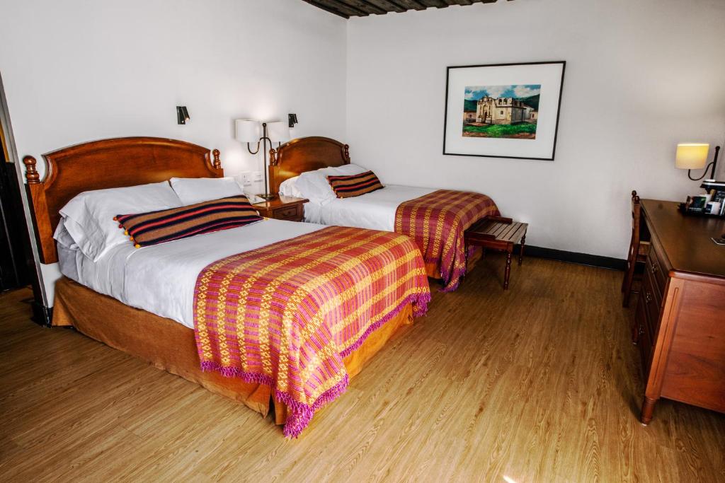 De Luxe Doble Room · Deluxe
